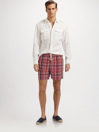 A quick-dry swim classic ideal for everyday swims and holiday jaunts alike, crafted with a standard fit and preppy plaid checks. Drawstring elastic waist Logo embroidery Side slash, patch pockets Mesh lining Inseam, about 4¾ 52% cotton/48% nylon; machine wash Imported 