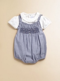 Classic stripes and a pretty smocked bodice add a splash of color to this charming bodysuit.Straight necklineStraps with back button closureSmocked bodiceBottom snapsCottonMachine washImported Please note: Number of snaps may vary depending on size ordered. 