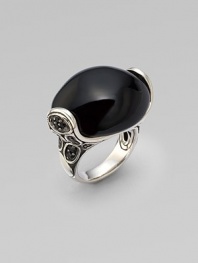 From the Kali Pebble Collection. A dramatic oval of smooth black chalcedony perches within a sterling silver setting sprinkled with pavé black sapphires in a smooth silver band.Black sapphire and black chalcedonySterling silverWidth, about 1¼Imported