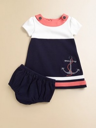 Set sail for this gorgeous, sailor-inspired frock in a classic a-line silhouette with anchor appliqué with matching bloomers.Boatneck with button detailShort sleevesBack buttonsA-lineStriped hemCottonMachine washImported