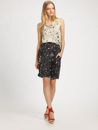 An inky pattern gives this playful pencil skirt a modern edge.Elasticized waistbandFront pleatsDraped side pocketsPull-on styleAbout 21 below natural waistSilkDry cleanImported