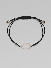 A knotted cord with a diamond encrusted, 18K rose gold, pear-shaped link. Diamonds, .18 tcw18K rose goldPolyester cordLink size, about ¾Length, about 13½ adjustableDrawstring closureImported 