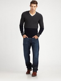 Two textures, two colors, one perfect sweater: a ribbed top portion is stitched to a fine-knit bottom half for a new spin on the colorblocked look in superior merino wool. V-neck Merino wool Dry clean Imported Additional Information Men's Shirts & Sweaters Size Guide 