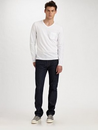 A low-rise version of the classic straight-leg fit, cut from premium American denim with a clean, saturated wash. Five-pocket style Inseam, about 32½ 98% cotton/2% Lycra Machine wash Made in USA 