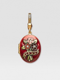 Garnet-colored CRYSTALLIZED - Swarovski Elements sparkle on this handcrafted, hand-enameled birthstone locket that opens to hold a favorite photo. Crystal Enamel 18k goldplated brass & brass-plated pewter Month indicated on the back Length, about 1¼ Width, about 1 Spring clip clasp Made in USA