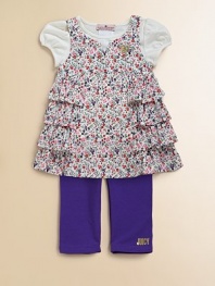 A pretty coordinating set includes a floral jumper, a basic tee and matching leggings for a sweet ensemble. Jumper Crewneck with v-neck slitSleevelessBack keyhole buttonSide rufflesCotton TeeCrewneckShort capped sleevesCotton Leggings Elastic WaistbandMachine washImported