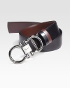 Smooth Italian leather with signature buckle. Gunmetal double gancini closure About 1½ wide Made in Italy