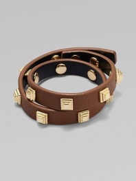 An edgy leather design with 16k goldplated hardware.LeatherPost closureAbout 16 longImported