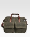 A versatile, dependable duffel is designed in a wax-impregnated canvas that combines the durability of nylon and the ease of cotton for greater strength and abrasion resistance. Zip closureRemovable shoulder strapExterior, interior pocketsCustom die-cast hardware18W X 10H X 9½DImported