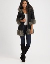 Graceful cotton-rich design with plush, faux-fur trim and three-quarter sleeves. Faux-fur drawstring hood Three-quarter sleeves Faux-fur cuffs and hem Longer length hits below the hips Fully lined 68% cotton/32% modal shell; polyester fill Machine wash Imported