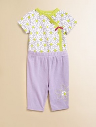 Crafted in plush cotton, this vibrant two-piece set is especially charming with pretty flower prints and embroidery.CrewneckShort sleevesFront snapsBottom snapsElastic waistbandCottonMachine washImported Please note: Number of snaps may vary depending on size ordered. 