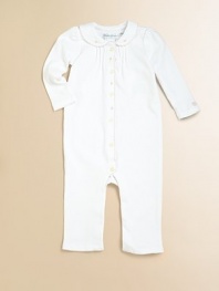 Rendered in luxuriously soft pima cotton, this adorable coverall is prettily updated with scalloped detailing.Crewneck with embroidered trimLong sleeves with embroidered cuffsBottom snaps for easy on and offPima cottonMachine washImported Please note: Number of buttons/snaps may vary depending on size ordered. 