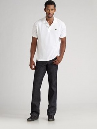 A sleek, dark wash cut straight through the seat and down the legs; ultimate versatility to dress up with a blazer or down with a polo. Five-pocket style Button fly Inseam, about 34 Cotton/elastane; machine wash Made in USA