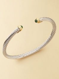From The Cable Kids Collection. A charming sterling silver cable with emerald end caps set in 18k gold. Emerald Sterling silver and 18k yellow gold Cable, 4mm Diameter, about 2 Made in USA