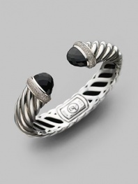 From the Waverly Collection. Sculpted cable design of sterling silver with pavé diamonds and black onyx tips. Diamonds, 0.76 tcw Diameter, about 2¼ Width, about 1¾ Hinge close Imported