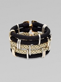 A five-row, rope design with two-tone metal accents and a goldtone clasp. RopeTwo-tone metalLength, about 8¼Spring clasp closureMade in USA