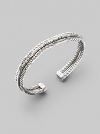 From the Silver Ice Collection. Two twisted cables of sterling silver, divided by a band of pavé diamonds set in white gold. Diamonds, 0.49 tcw Sterling silver & 14k white gold Cable, 3mm Diameter, about 2½ Made in USA