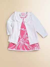 A charming layer for little ones with a darling ruffled collar and a palm-tree logo.Ruffled scoop neckButton-down placketLong sleeves with ribbed cuffsRibbed hemCottonMachine washImported