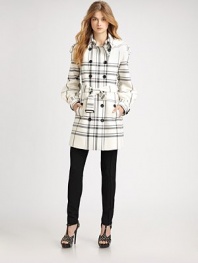 Classic trench styling, in an iconic check patterned wool blend.Foldover collarEpaulettesDouble breasted button frontSelf beltAsymmetrical sleevesBelted cuffsFully linedAbout 31 from shoulder to hem52% polyester/43% wool/5% lyocellDry cleanMade in Italy of imported fabricModel shown is 5'9½ (176cm) wearing US size 4. Additional Information Women's Premier Designer & Contemporary Size Guide 