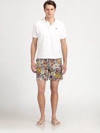 Be ready to hit the beach and beyond in these classic, tailored swim trunks, set in quick-drying nylon.Elastic drawstring waistZip flySide slash, back welt pocketsFully linedInseam, about 7NylonMachine washImported