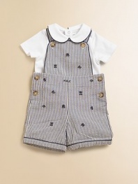 Preppy heritage style is adorably interpreted with an ultra-comfortable cotton jersey set that pairs a striped seersucker overall with a short-sleeved solid bodysuit. Overall Button-front shoulder strapsSleevelessSide buttons Bodysuit Peter Pan collarShort sleevesBack snapsBottom snapsCottonMachine washImported Please note: Number of buttons/snaps may vary depending on size ordered. Additional InformationKid's Apparel Size Guide 