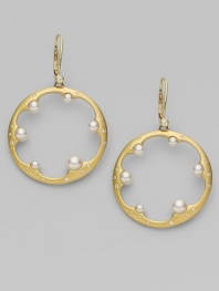 18K yellow gold scalloped hoops with graduated cultured pearls and small diamond accents.5.5mm - 3.5mm cultured pearls Diamond, 0.2 tcw 18K yellow gold Leverback closure Imported 