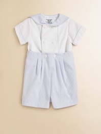 A charming, sailor-inspired set includes a pique button-down shirt and pleated seersucker shorts for a nautical ensemble. Shirt Rounded collar with striped trimShort sleeves with striped trimDouble-breasted button-front with striped trim50% polyester/50% cotton Shorts Button-on shorts Elastic waistbandSlightly pleated67% polyester/33% cottonMachine washImported Please note: Number of buttons/snaps may vary depending on size ordered. 