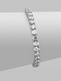 EXCLUSIVELY AT SAKS. Clear cubic zirconia stones in a classic tennis bracelet design.Cubic zirconia Rhodium plated sterling silver Length, about 7 Push lock closure Imported 