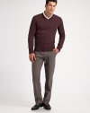 A new standard in menswear dressing, shaped from luxurious Scottish cashmere. V-neckRibbed detailCashmereDry cleanImported