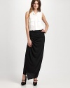 This sleek, ruched silhouette can be worn as a skirt or strapless dress.StraplessRuched throughoutMock-wrap frontAbout 43 long70% tencel/30% cottonDry cleanImported