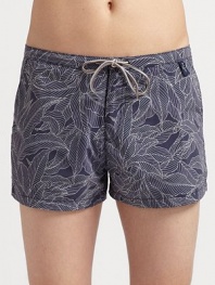 The ultimate tropical style for the beach and beyond in smooth, quick-dry nylon. Elastic drawstring waist Side slash, back zip pockets Mesh lining Inseam, about 4 Nylon Machine wash Imported 