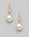 A perfectly round sphere of white organic pearl, sparkling stud and 18k gold vermeil for a look of timeless elegance.12mm round white pearls Cubic zirconia 18k gold vermeil Drop, about 1½ Ear wire Made in Spain 