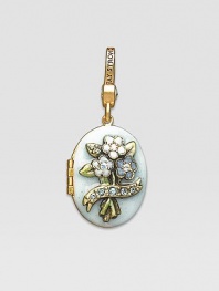 Aquamarine-colored CRYSTALLIZED - Swarovski Elements sparkle on this handcrafted, hand-enameled birthstone locket that opens to hold a favorite photo. Crystal Enamel 18k goldplated brass & brass-plated pewter Month indicated on the back Length, about 1¼ Width, about 1 Spring clip clasp Made in USA