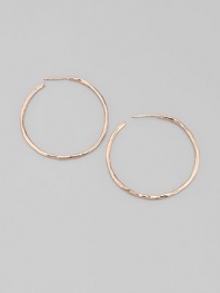 Slender hammered hoops of sterling silver and 18k gold, finished in the warm glow of 18k rose goldplating. An alloy of 18K gold and sterling silver plated with 18K rose gold Diameter, about 1¾ Post back Imported
