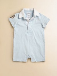 Preppy short-sleeved shortall in soft cotton is designed with an athletic patch on the arm for a sporty look.Ribbed polo collarShort sleevesHidden front button placketBottom snapsCottonMachine washImported Please note: Number of buttons and snaps may vary depending on size ordered. 
