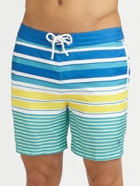A quick-dry look with a colorful melange of printed stripes revive a classic beach style. Drawstring waistBack flap pocketsMesh liningInseam, about 6PolyesterMachine washImported 