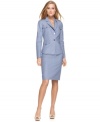 Calvin Klein's suit mingles a spring-ready linen blend with crisp design details, like buttoned shoulder epaulettes.
