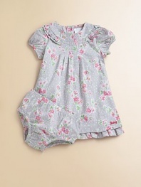 A sweet, frilly floral design with adorable matching bloomers.Crewneck with pleats and rufflesShort cap sleevesBack buttonsRuffled hemElastic waistband and leg openingsCottonMachine washImportedAdditional InformationKid's Apparel Size Guide 