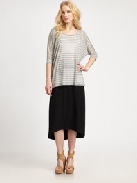 Simply sophisticated, this knit skirt offers a brand new take on a beloved classic, thanks to its curved, high-low hem. Curved, high-low hemAbout 32 long92% rayon/8% Lycra®Machine washMade in USA of imported fabric Model shown is 5'10 (177cm) wearing US size Small. 