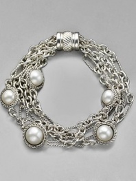 Pearls from the deep are captured in a cabled settings tangled in a netting of sterling chains. Mixed link bracelet 7½ long Cable barrel clasp Imported