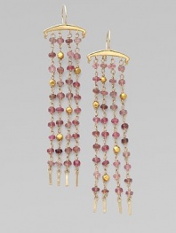 A four-strand fringe design dangles tiny beads of pink tourmaline and 18k gold from a polished 14k gold bar.Pink tourmaline 14k and 18k yellow gold Length, about 3 Ear wire Imported