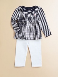 An essential three-piece set, perfect for mixing and matching, features a striped cardigan