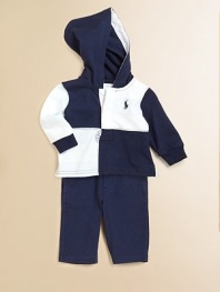 The epitome of sporty style, a timeless set includes a quartered cotton mesh rugby hoodie with an athletic pant in supremely soft cotton. Hoodie Attached hoodLong sleeves with ribbed cuffsFront buttonsEven-vented hem Pants Sewn flyElasticized waistband with bow tieVertical on-seam hand pocketsCottonMachine washImported