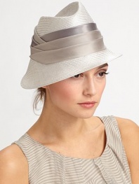 Sophisticated asymmetric design with pleated silk band.StrawWide silk bandGraduated brim from 1¼ to 3Spot cleanMade in Italy