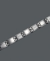 Who says that diamonds are just a girl's best friend? This bracelet combines edginess with a little flair. Bracelet crafted in stainless steel with round-cut diamond (3/4 ct. t.w.). Approximate length: 8-1/2 inches.