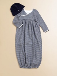 An adorable long-sleeved gown is rendered in soft, striped cotton jersey.Cross-wrap necklineLong sleevesPullover styleGathered empire waistElastic bottom bandCottonMachine washImported