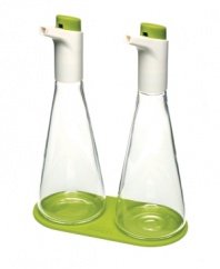 Best-dressed! Your salads and dishes get high marks when coupled with this oil and vinegar set, which features precision flow control so your food never gets doused and always gets just the right amount of dressing. The curved design of each flask fits comfortably in your hand and adds a sleek accent, sitting pretty on the included silicone coaster. 1-year warranty.