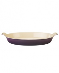 Enhance hot comfort foods like mac n' cheese, potatoes au gratin and peach cobbler with this versatile – and beautifully hued – baking dish from Le Creuset. A wide, shallow shape maximizes surface area to encourage browning and also cooks foods flawlessly on your stovetop. Great for marinating, too!