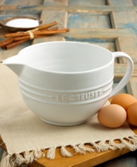Mix and pour the perfect pancakes, waffles and crepes with Le Creuset's beautiful batter bowl. Crafted using traditional techniques, this stoneware bowl is fired at ultra-hot temperatures giving it unrivaled strength and durability, while its timeless design lends a distinctive charm to everyday kitchen tasks. Limited lifetime warranty.