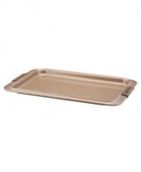 A cookie sheet that knows when to let go, this piece of bakeware is an essential for hassle-free cooking with a strong carbon steel core coated in a durable bronze nonstick finish that provides quick and effortless food release and fast cleaning. Designed with wide rimming along the edge, this cookie sheet is easy to maneuver and handle even with bulky oven mitts. Limited lifetime warranty.